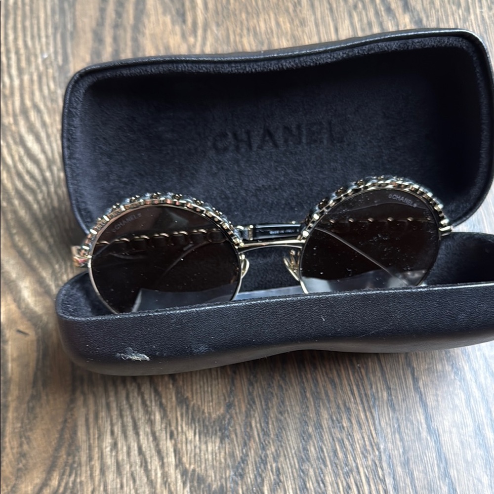 CHANEL Black and Gold Round Sunglasses